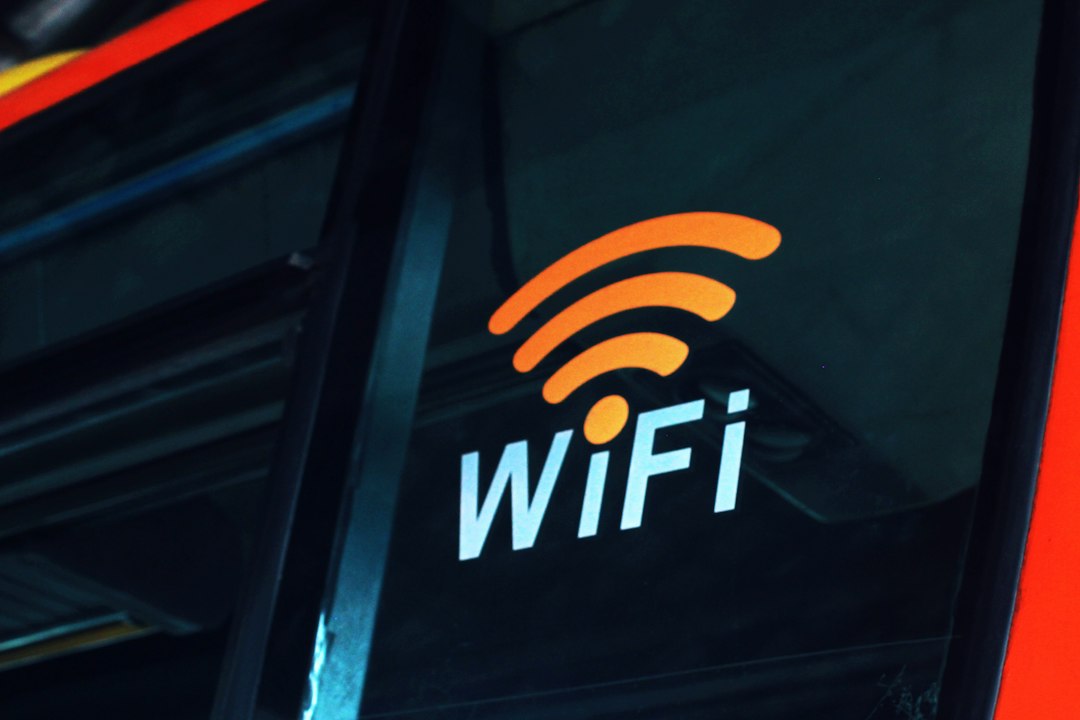 who-we-are a-close-up-of-the-wifi-logo-on-the-side-of-a-bus-sodvyqqo4uu